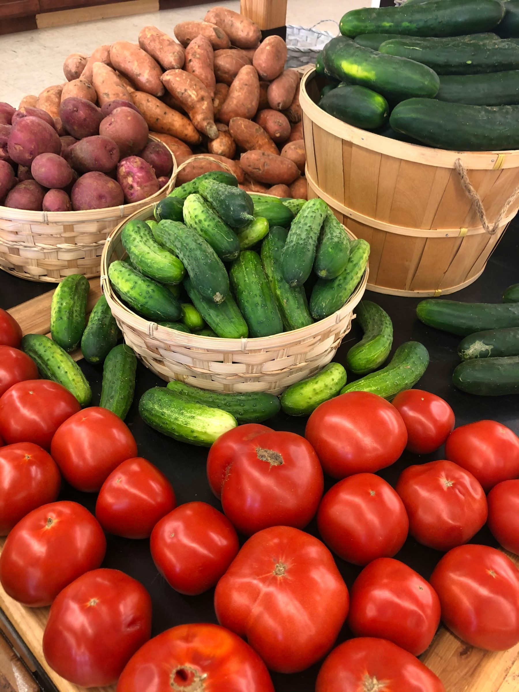 Fresh produce in bushel baskets