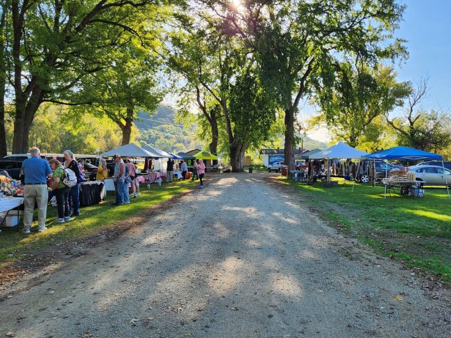 Customers at the outdoor Ferryville Farmers market
